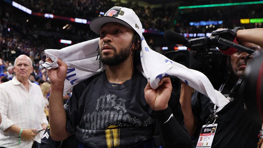 New York Knicks guard Jalen Brunson stands at the end of the court prior to the championship trophy celebration.
