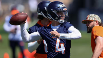 May 23, 2024; Englewood, CO, USA; Denver Broncos quarterback Zach Wilson (4) during organized team activities at Centura Health Training Center. Mandatory Credit: Isaiah J. Downing-USA TODAY Sports