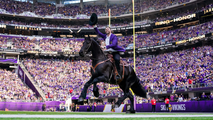 Oct 30, 2022; Minneapolis, Minnesota, USA; Minnesota Vikings Jared Allen (69) rides in on a horse before his induction into the Ring of Honor against the Arizona Cardinals at half time at U.S. Bank Stadium. Mandatory Credit: Brad Rempel-USA TODAY Sports