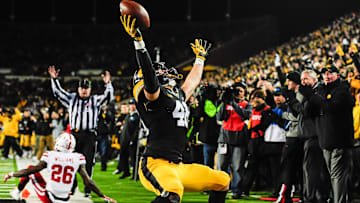 Nov 25, 2016; Iowa City, IA, USA; Iowa Hawkeyes tight end George Kittle (46) celebrates after a touchdown catch during the second half against the Nebraska Cornhuskers at Kinnick Stadium. Mandatory Credit: Jeffrey Becker-Imagn Images