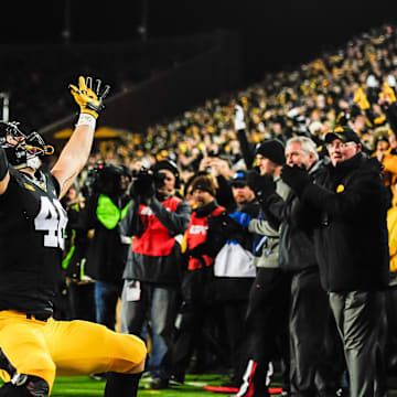 Nov 25, 2016; Iowa City, IA, USA; Iowa Hawkeyes tight end George Kittle (46) celebrates after a touchdown catch during the second half against the Nebraska Cornhuskers at Kinnick Stadium. Mandatory Credit: Jeffrey Becker-Imagn Images