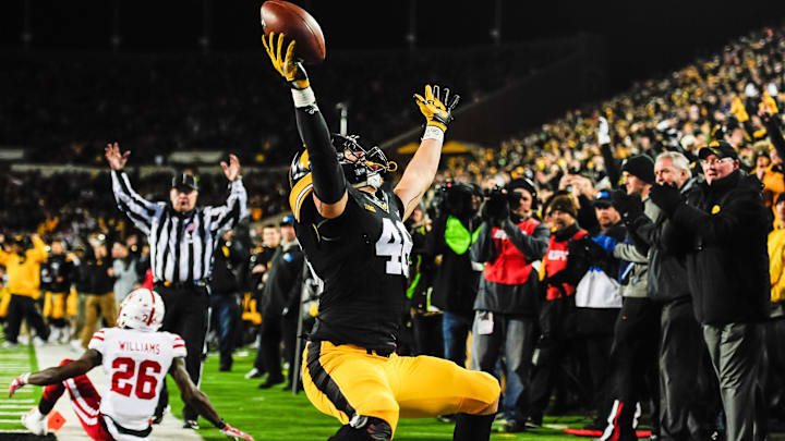 Nov 25, 2016; Iowa City, IA, USA; Iowa Hawkeyes tight end George Kittle (46) celebrates after a touchdown catch during the second half against the Nebraska Cornhuskers at Kinnick Stadium. Mandatory Credit: Jeffrey Becker-Imagn Images