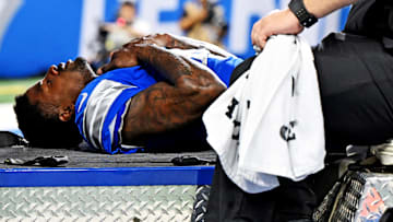 Detroit Lions cornerback D.J. Reed (4) is carted off the field after an injury during the second half against the Cleveland Browns at Ford Field.