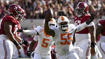 Oct 21, 2023; Tuscaloosa, Alabama, USA; Tennessee Volunteers defensive lineman Omarr Norman-Lott (55) celebrates after receiving a fumble by Alabama Crimson Tide quarterback Jalen Milroe (4) at Bryant-Denny Stadium. Mandatory Credit: Gary Cosby Jr.-Imagn Images