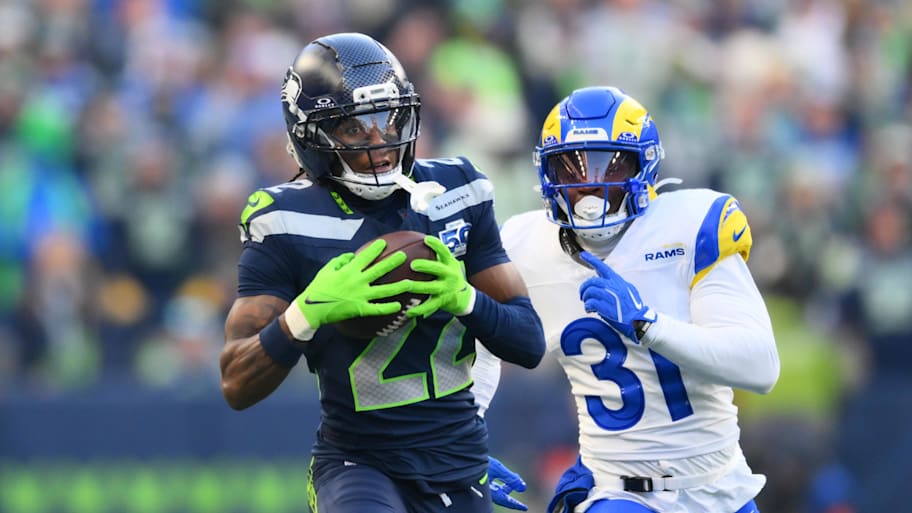 Rashid Shaheed runs with the ball against the Rams.