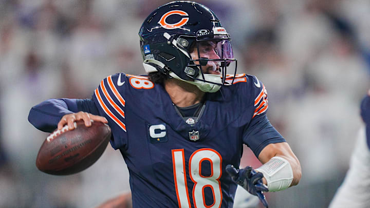 Dec 16, 2024; Minneapolis, Minnesota, USA; Chicago Bears quarterback Caleb Williams (18) passes against the Minnesota Vikings in the third quarter at U.S. Bank Stadium. Mandatory Credit: Brad Rempel-Imagn Images