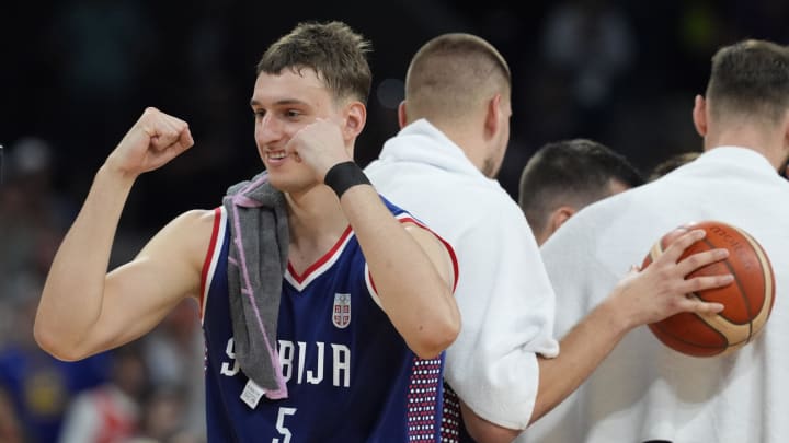 Jul 31, 2024; Villeneuve-d'Ascq, France; Serbia power forward Nikola Jovic (5) celebrates after defeating Puerto Rico during the Paris 2024 Olympic Summer Games at Stade Pierre-Mauroy. Mandatory Credit: John David Mercer-USA TODAY Sports