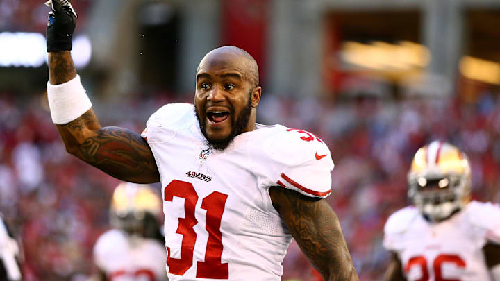 Dec 29, 2013; Phoenix, AZ, USA; San Francisco 49ers safety Donte Whitner (31) reacts against the Arizona Cardinals at University of Phoenix Stadium. Mandatory Credit: Mark J. Rebilas-Imagn Images