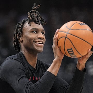 Mar 23, 2025; Toronto, Ontario, CAN; Toronto Raptors guard Ja'Kobe Walter (14) goes to shoot a basket during warmups before a game against the San Antonio Spurs at Scotiabank Arena. Mandatory Credit: John E. Sokolowski-Imagn Images