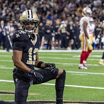 Sep 14, 2025; New Orleans, Louisiana, USA;  New Orleans Saints wide receiver Chris Olave (12) reacts to dropping a pass in the end zone against the San Francisco 49ers during the first half at Caesars Superdome. Mandatory Credit: Stephen Lew-Imagn Images