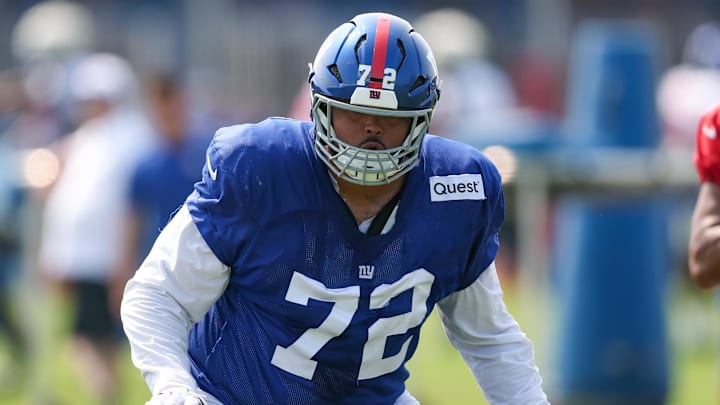 Aug 4, 2025; East Rutherford, NJ, USA;  New York Giants guard Jermaine Eluemunor (72) blocks during training camp at Quest Diagnostics Training Center.  
