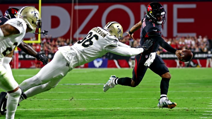 Oct 20, 2022; Arizona Cardinals quarterback Kyler Murray (1) reaches for the end zone against New Orleans Saints defensive end Carl Granderson (96)