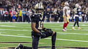 Sep 14, 2025; New Orleans, Louisiana, USA;  New Orleans Saints wide receiver Chris Olave (12) reacts to dropping a pass in the end zone against the San Francisco 49ers during the first half at Caesars Superdome. Mandatory Credit: Stephen Lew-Imagn Images
