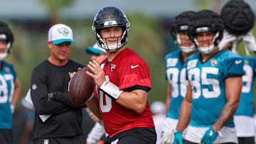 Jul 26, 2024; Jacksonville, FL, USA; Jacksonville Jaguars quarterback Mac Jones (10) participates in training camp at Miller Electric Center. Mandatory Credit: Nathan Ray Seebeck-USA TODAY Sports