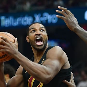 Dec 29, 2023; Cleveland, Ohio, USA; Cleveland Cavaliers center Tristan Thompson (12) drives to the basket against Milwaukee Bucks forward Bobby Portis (9) during the first half at Rocket Mortgage FieldHouse. 