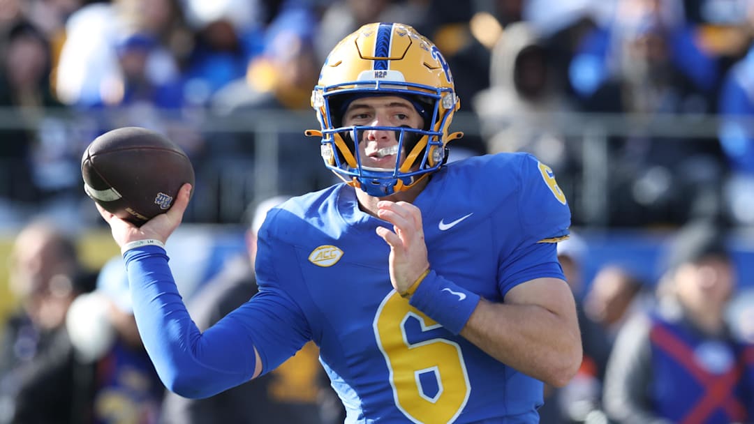 Nov 29, 2025; Pittsburgh, Pennsylvania, USA;  Pittsburgh Panthers quarterback Mason Heintschel (6) passes against the Miami Hurricanes during the first quarter at Acrisure Stadium. Mandatory Credit: Charles LeClaire-Imagn Images