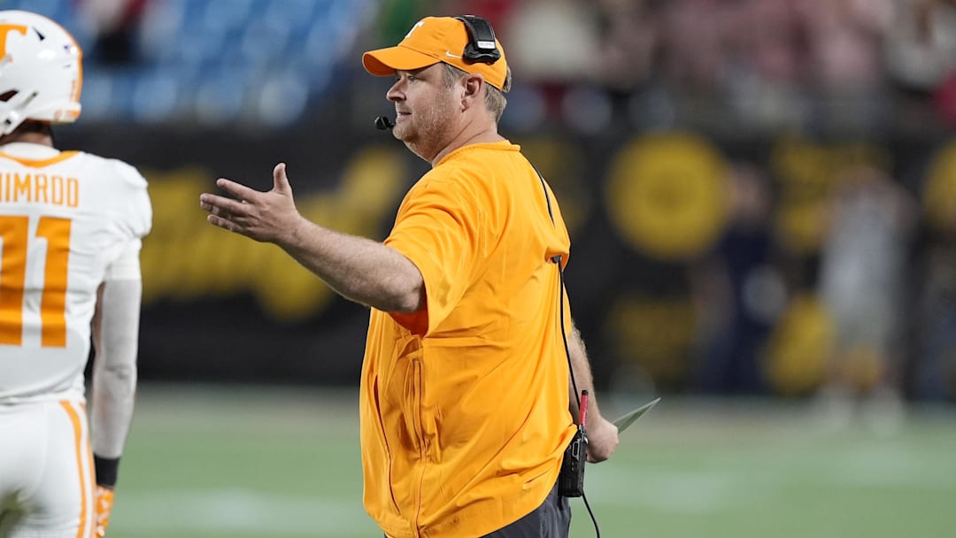 Sep 7, 2024; Charlotte, North Carolina, USA; Tennessee Volunteers head coach Josh Heupel questions a call by the officials during the second quarter against the North Carolina State Wolfpack at the Dukes Mayo Classic at Bank of America Stadium. Mandatory Credit: Jim Dedmon-Imagn Images