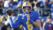 Nov 29, 2025; Pittsburgh, Pennsylvania, USA;  Pittsburgh Panthers quarterback Mason Heintschel (6) passes against the Miami Hurricanes during the first quarter at Acrisure Stadium. Mandatory Credit: Charles LeClaire-Imagn Images