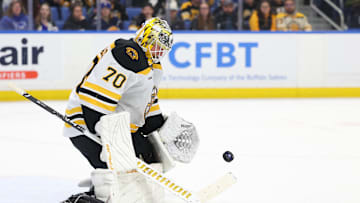 Apr 6, 2025; Buffalo, New York, USA;  Boston Bruins goaltender Joonas Korpisalo (70) looks to make a save during the second period against the Buffalo Sabres at KeyBank Center. Mandatory Credit: Timothy T. Ludwig-Imagn Images