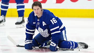 Apr 17, 2025; Toronto, Ontario, CAN; Toronto Maple Leafs right wing Mitch Marner (16) stretches during the warmup before a game against the Detroit Red Wings at Scotiabank Arena.
