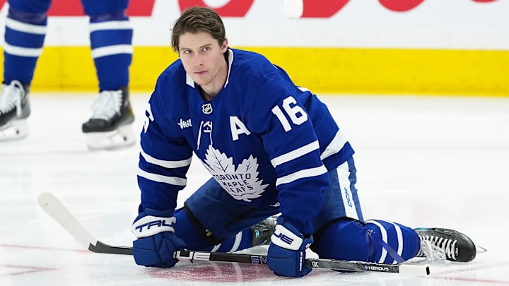 Apr 17, 2025; Toronto, Ontario, CAN; Toronto Maple Leafs right wing Mitch Marner (16) stretches during the warmup before a game against the Detroit Red Wings at Scotiabank Arena.