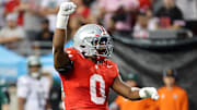 Sep 13, 2025; Columbus, Ohio, USA; Ohio State Buckeyes linebacker Sonny Styles (0) celebrates a tackle for loss during the second quarter against the Ohio Bobcats at Ohio Stadium. Mandatory Credit: Joseph Maiorana-Imagn Images