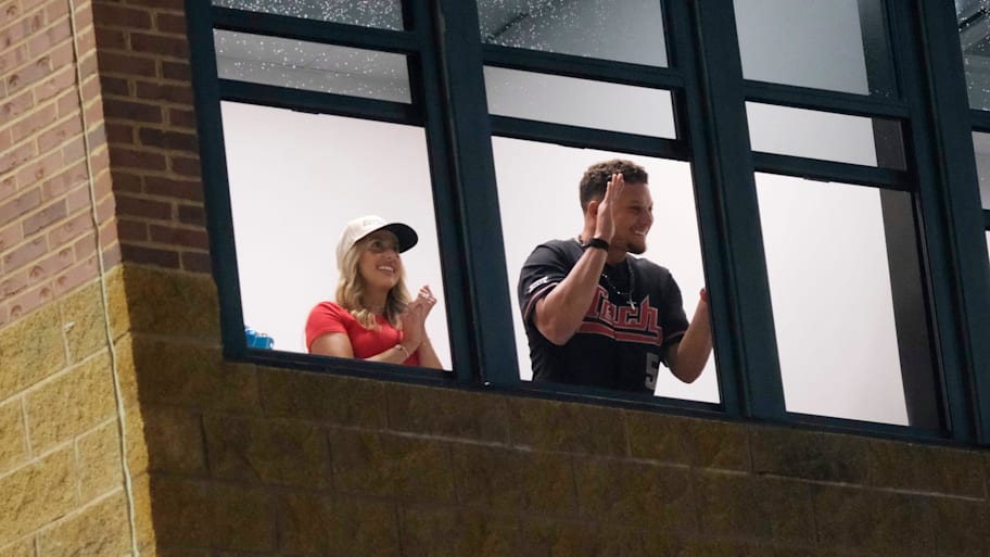 Patrick Mahomes and his wife Brittany cheer during the WCWS on Thursday, June 5. | DOUG HOKE/THEOKLAHOMAN / USA TODAY NETWORK via Imagn Images
