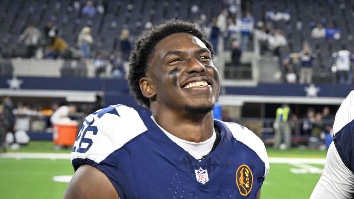 Nov 23, 2023; Arlington, Texas, USA; Dallas Cowboys cornerback DaRon Bland (26) eats turkey legs after the Cowboys victory over the Washington Commanders at AT&T Stadium. 