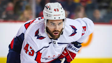 Mar 18, 2024; Calgary, Alberta, CAN; Washington Capitals right wing Tom Wilson (43) during the face off against the Calgary Flames during the first period at Scotiabank Saddledome. Mandatory Credit: Sergei Belski-Imagn Images