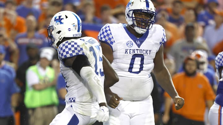 Sep 10, 2022; Gainesville, Florida, USA; Kentucky Wildcats defensive tackle Deone Walker (0) reacts after making a tackle against the Florida Gators during the second half at Ben Hill Griffin Stadium. Mandatory Credit: Kim Klement-Imagn Images