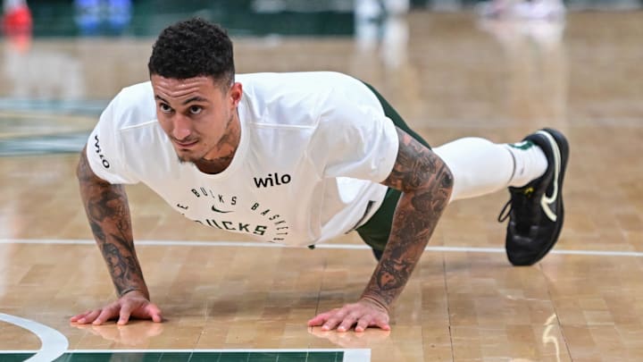 Milwaukee Bucks forward Kyle Kuzma does pushups before the game against the New Orleans Pelicans at Fiserv Forum on April 10.