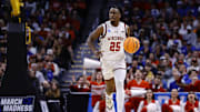 Mar 22, 2025; Denver, CO, USA; Wisconsin Badgers guard John Blackwell (25) dribbles the ball against the Brigham Young Cougars during the first half in the second round of the NCAA Tournament  at Ball Arena. Mandatory Credit: Isaiah J. Downing-Imagn Images