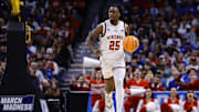 Mar 22, 2025; Denver, CO, USA; Wisconsin Badgers guard John Blackwell (25) dribbles the ball against the Brigham Young Cougars during the first half in the second round of the NCAA Tournament  at Ball Arena. Mandatory Credit: Isaiah J. Downing-Imagn Images