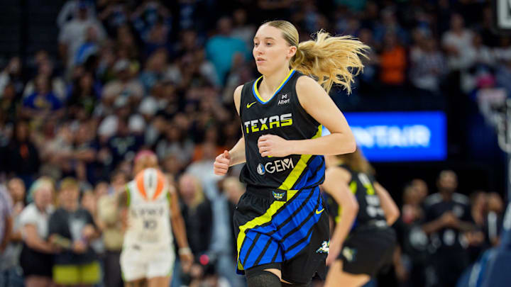 Sep 1, 2025; Minneapolis, Minnesota, USA; Dallas Wings guard Paige Bueckers (5) in action against Minnesota Lynx in the first quarter at Target Center. Mandatory Credit: Matt Blewett-Imagn Images