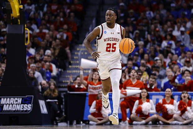 Wisconsin guard John Blackwell dribbles the ball.