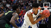 Mar 23, 2019; Salt Lake City, UT, USA; Gonzaga Bulldogs forward Rui Hachimura (21) eyes Baylor Bears guard Mario Kegler (4) during the second half in the second round of the 2019 NCAA Tournament at Vivint Smart Home Arena. Images