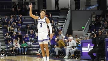 Dec 29, 2023; Evanston, Illinois, USA; Northwestern Wildcats guard Ty Berry (3) celebrates his three
