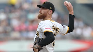 Aug 5, 2025; Pittsburgh, Pennsylvania, USA;  Pittsburgh Pirates starting pitcher Mike Burrows (53) delivers a pitch against the San Francisco Giants during the first inning at PNC Park. Mandatory Credit: Charles LeClaire-Imagn Images