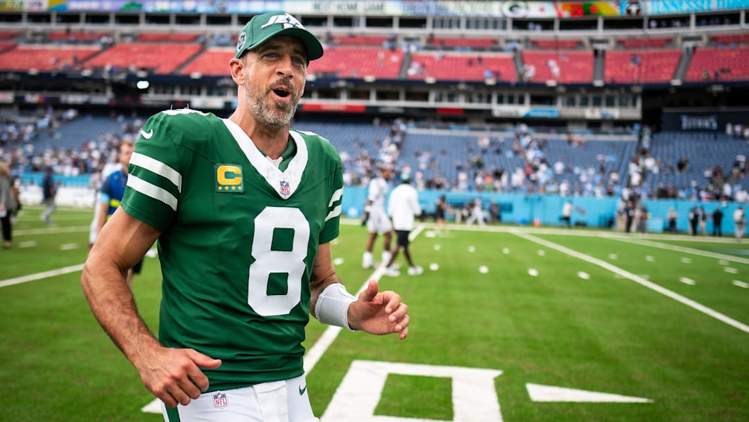 New York Jets quarterback Aaron Rodgers (8) exits the field after the Jets beat the Tennessee Titans 24-17 at Nissan Stadium in Nashville, Tenn., Sunday, Sept. 15, 2024.