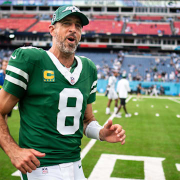 New York Jets quarterback Aaron Rodgers (8) exits the field after the Jets beat the Tennessee Titans 24-17 at Nissan Stadium in Nashville, Tenn., Sunday, Sept. 15, 2024.