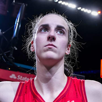 Indiana Fever guard Caitlin Clark (22) gives a thumbs up to fans after an interview Sunday, Sept. 8, 2024, during a game between the Indiana Fever and the Atlanta Dream at Gainbridge Fieldhouse in Indianapolis. The Fever defeated the Dream in overtime, 104-100.