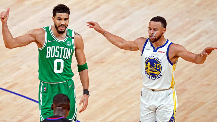 Jun 2, 2022; San Francisco, California, USA; Boston Celtics forward Jayson Tatum (0) and Golden State Warriors guard Stephen Curry (30) reacts to the referee during the third quarter in game one of the 2022 NBA Finals at Chase Center. Mandatory Credit: Cary Edmondson-USA TODAY Sports