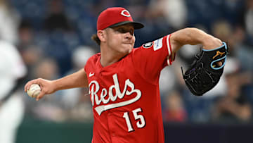 Jun 9, 2025; Cleveland, Ohio, USA; Cincinnati Reds relief pitcher Emilio Pagan (15) throws a pitch during the ninth inning against the Cleveland Guardians at Progressive Field.