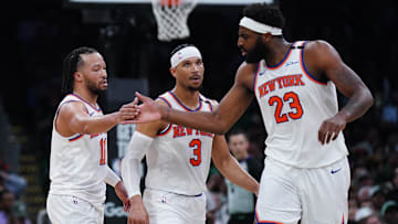 New York Knicks guard Jalen Brunson and center Mitchell Robinson  react after a play. Mandatory Credit: David Butler II-Imagn Images