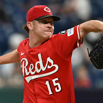 Jun 9, 2025; Cleveland, Ohio, USA; Cincinnati Reds relief pitcher Emilio Pagan (15) throws a pitch during the ninth inning against the Cleveland Guardians at Progressive Field. Mandatory Credit: Ken Blaze-Imagn Images