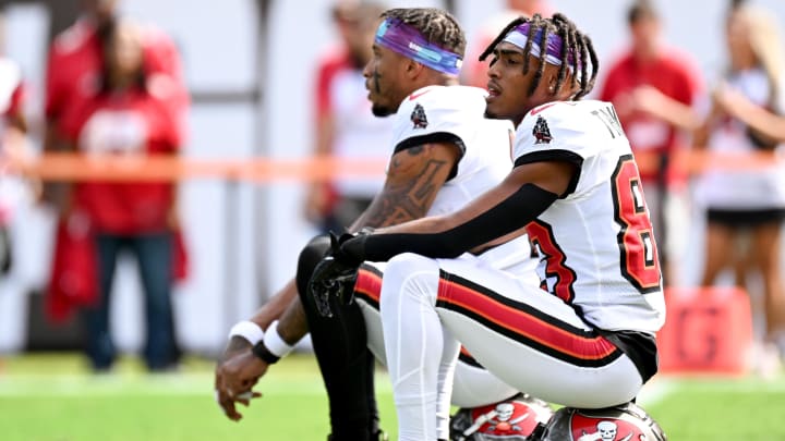 Oct 22, 2023; Tampa, Florida, USA; Tampa Bay Buccaneers wide receiver Deven Thompkins (83) and wide receiver Trey Palmer (10) sit during warm ups before the game against the Atlanta Falcons at Raymond James Stadium. Mandatory Credit: Jonathan Dyer-USA TODAY Sports