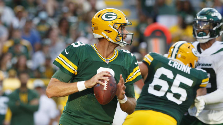 Aug 21, 2021; Green Bay, Wisconsin, USA;  Green Bay Packers quarterback Jake Dolegala (9) drops back to pass during the fourth quarter against the New York Jets at Lambeau Field. Mandatory Credit: Jeff Hanisch-USA TODAY Sports