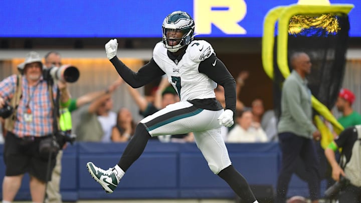 Oct 8, 2023; Inglewood, California, USA; Philadelphia Eagles linebacker Haason Reddick (7) celebrates after sacking Los Angeles Rams quarterback Matthew Stafford (9) during the second half at SoFi Stadium. Mandatory Credit: Gary A. Vasquez-Imagn Images