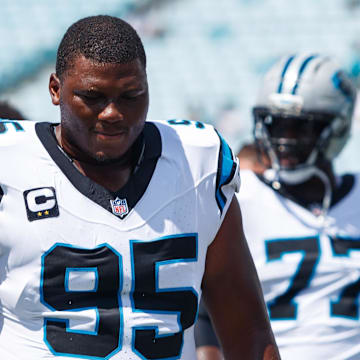 Sep 7, 2025; Jacksonville, Florida, USA; Carolina Panthers defensive end Derrick Brown (95) against the Jacksonville Jaguars at EverBank Stadium. Mandatory Credit: Morgan Tencza-Imagn Images