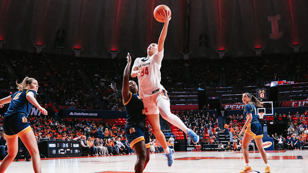 Illinois guard Maddie Webber (34) rises for a finish in the Illini's 84-64 win over Murray State last week at the State Farm Center in Champaign, Illinois.